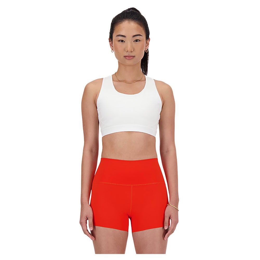 new balance sleek medium support pocket sports bra orange l femme